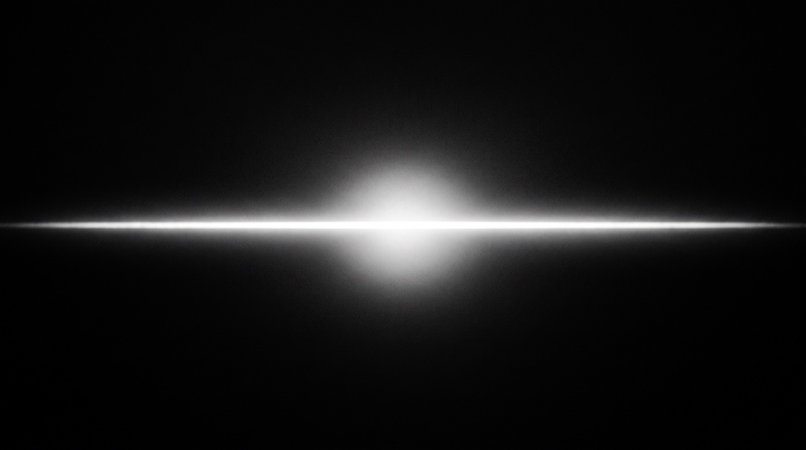 A single line of light across a black field